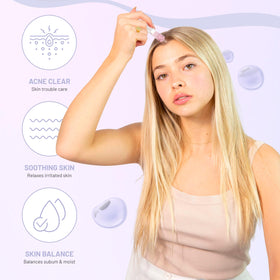 BRÜUN ampoule held in hand showing 1.18 oz size and portability