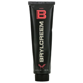 Brylcreem jar in hand for scale and easy everyday use