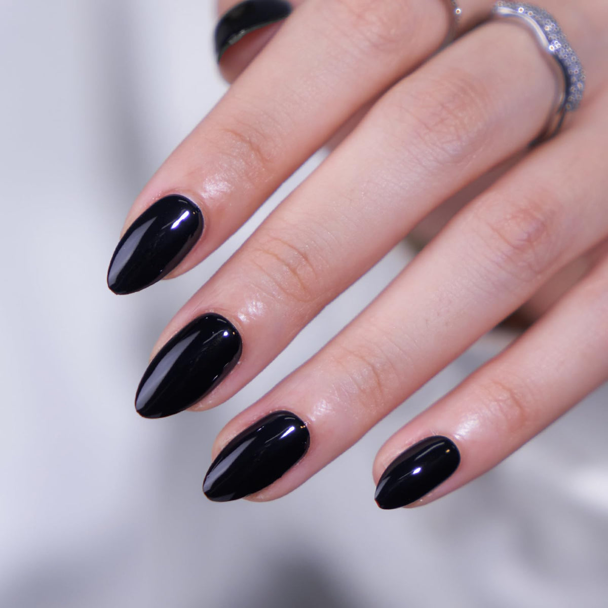 BTArtbox nails held in hand to show scale and easy natural-length styling benefit
