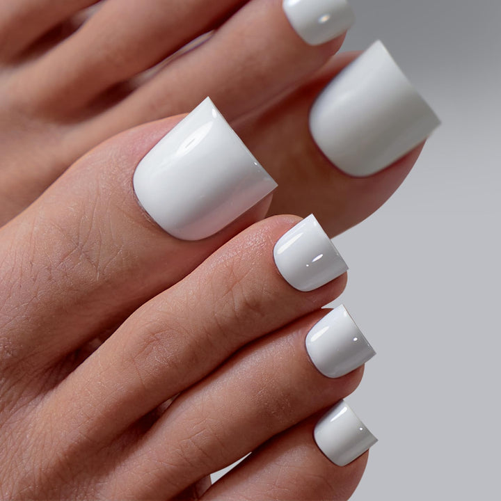 BTArtbox front packaging showing ivory white press-on toenails and kit benefits