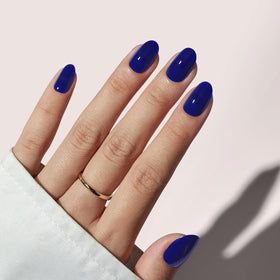 BTArtbox front packaging showing navy press on nails and kit benefits