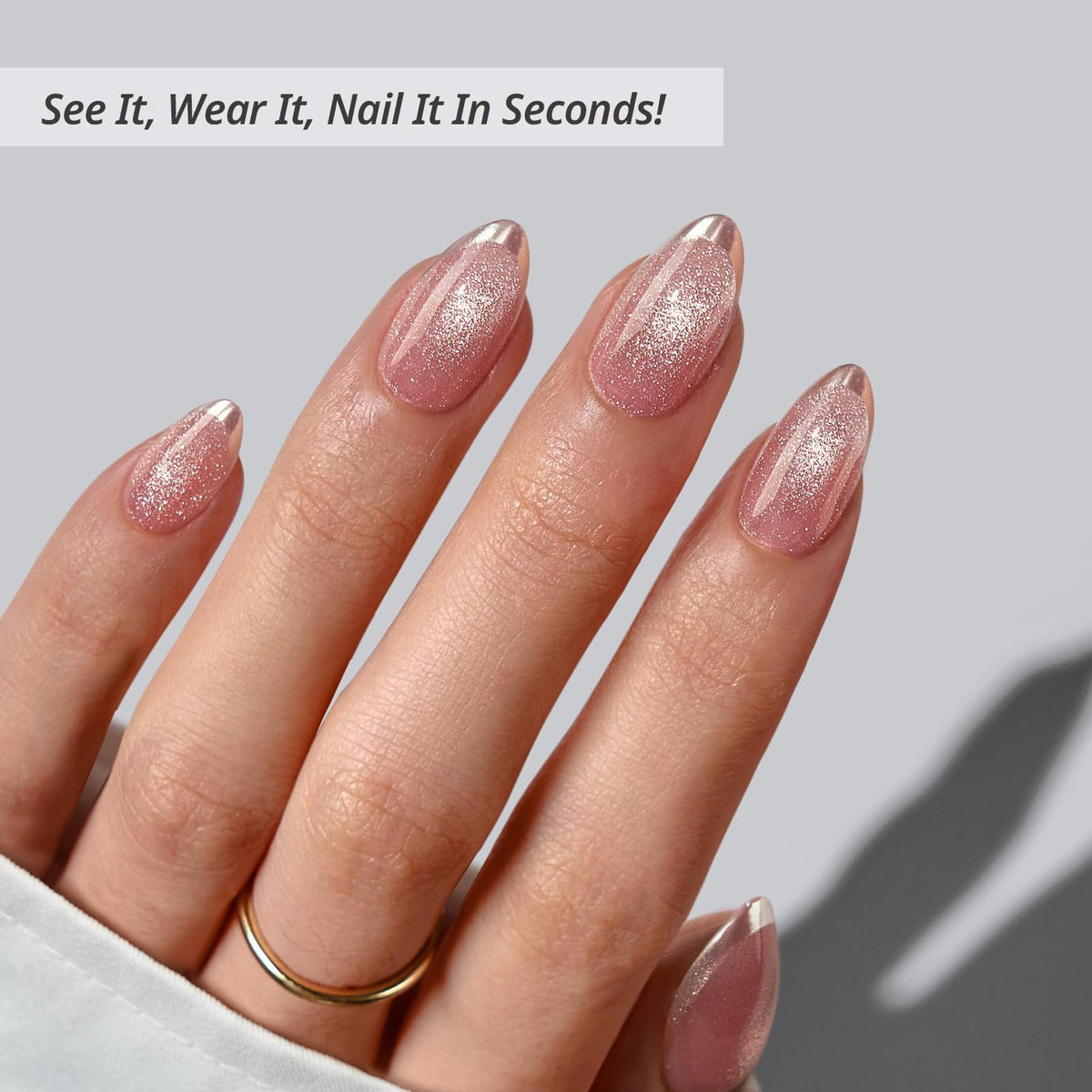 BTArtbox nails held to show almond length and scale for wearable, everyday look