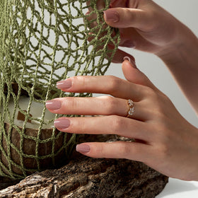 BTArtbox hand model wearing short squoval Taro Nude nails showing natural appearance