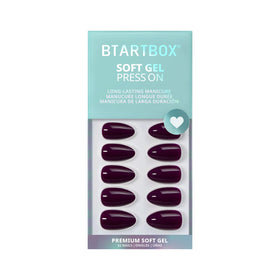 BTArtbox lifestyle scene with hands in a cozy winter setting wearing Poison Potion nails