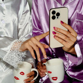 BTArtbox press-on nails held in hand to show size and realistic scale for confident fit