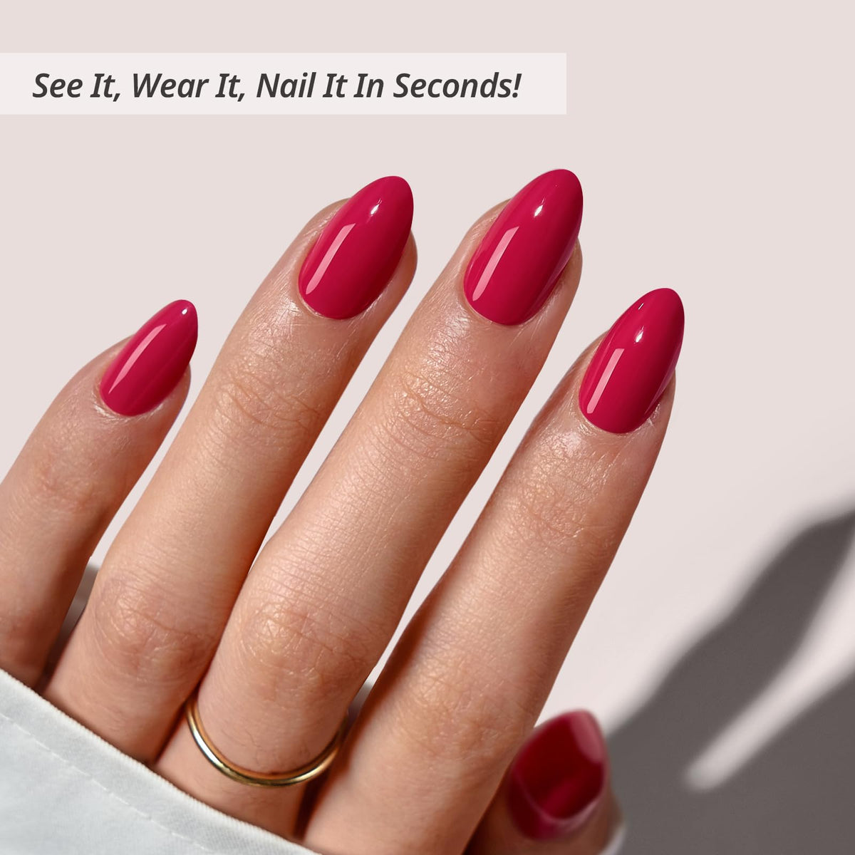 BTArtbox close-up of almond nail texture and opaque raspberry red finish, natural look