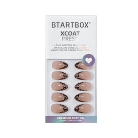 BTArtbox nails beside a coin for scale to show realistic short length and wearable size