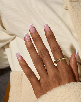 BTArtboxnails application in progress demonstrating press-on placement and fast DIY convenience