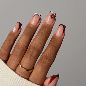 BTArtboxnails shown on hand displaying natural-looking French manicure