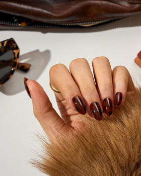 BTArtboxnails side profile of short almond tip showing thin, comfortable fit