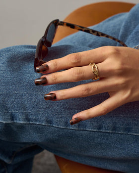 BTArtboxnails nails held in hand to show scale and short square shape benefit natural fit