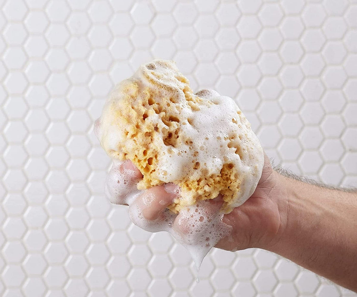 Bulldog texture on hand demonstrating gentle lathering and moisturizing feel