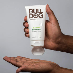 Bulldog bottle on a bathroom shelf indicating daily grooming routine and tidy storage