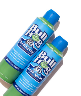 Person applying Bullfrog spray outdoors illustrating quick full-body coverage