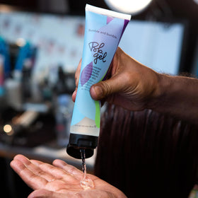 bumble and bumble gel in use styling hair demonstrates hold and brushable finish benefit