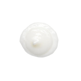 Bumble and bumble cream on hand demonstrating silky lightweight formula