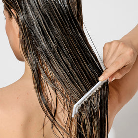 Bumble and bumble creamy conditioner texture on hand for slip and smoothness