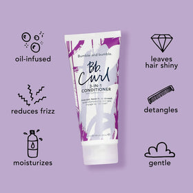 Bumble and bumble conditioner being worked into curly hair showing frizz reduction benefit