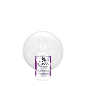 Bumble and bumble front packaging travel bottle showing compact size and clear label benefit