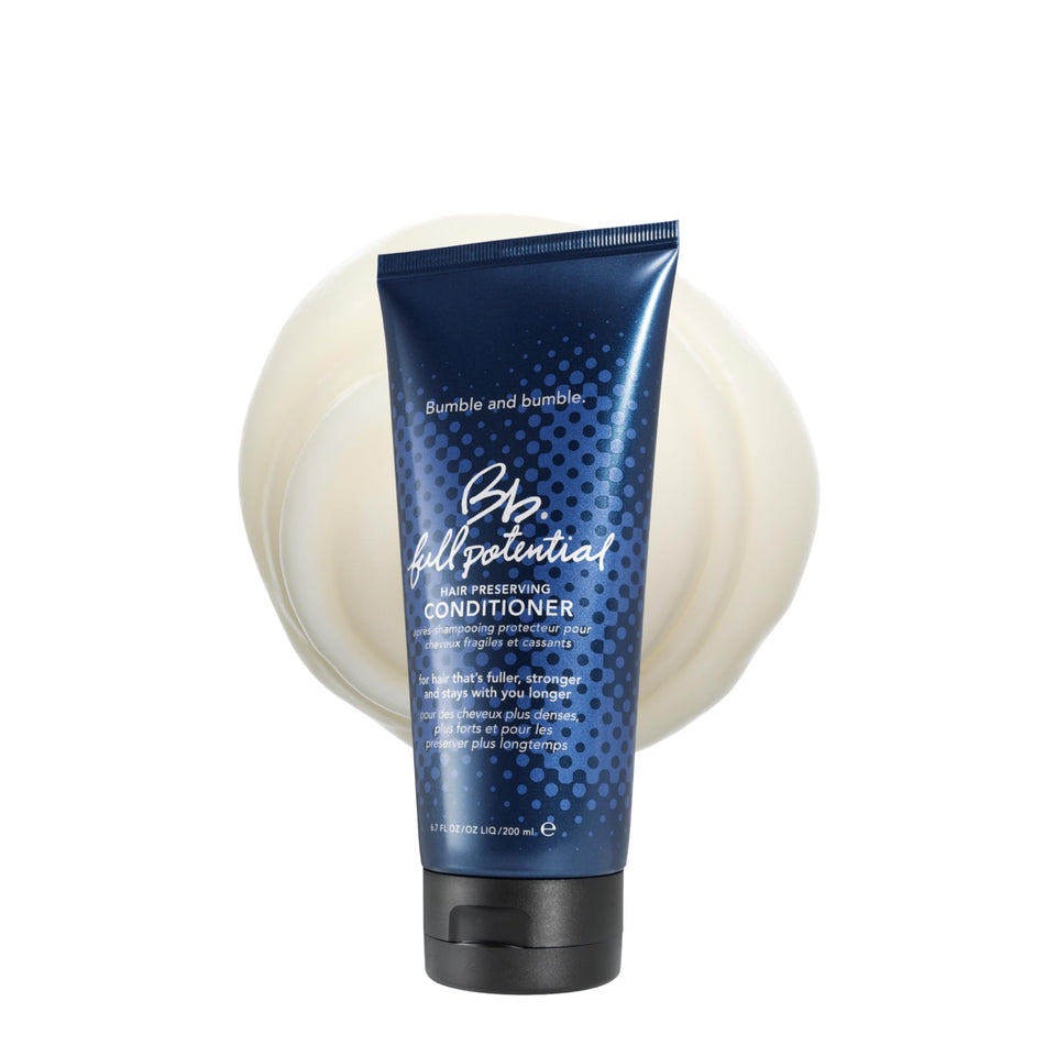 Bumble and bumble front packaging showing bottle and product benefit of strength