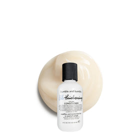 bumble and bumble front travel bottle showing compact packaging and easy use