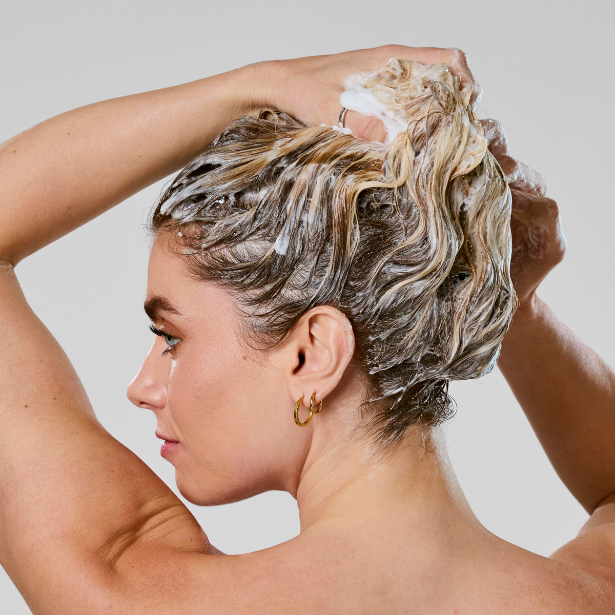 Bumble and bumble shampoo applied to wet hair for detangling and reduced breakage