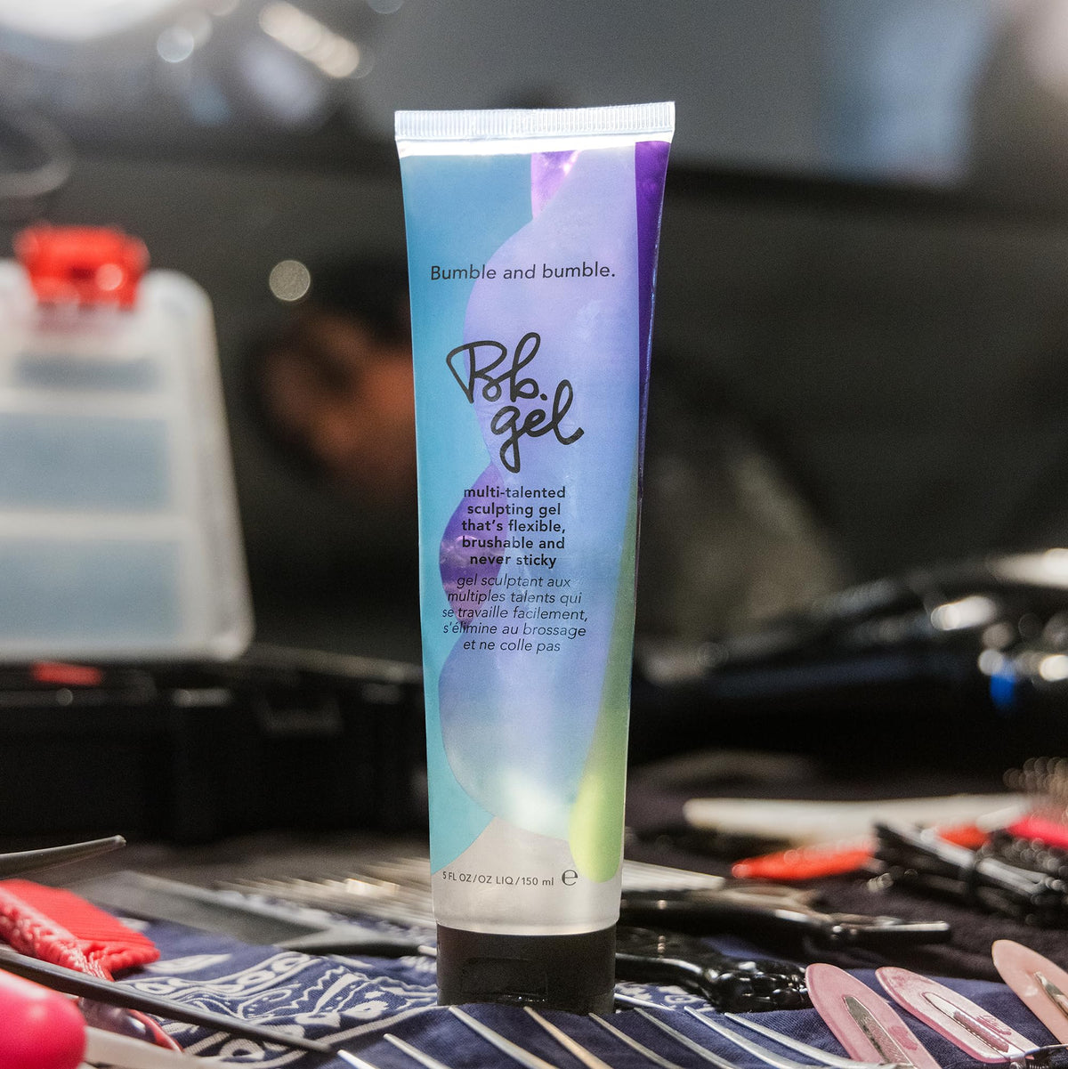 bumble and bumble on bathroom shelf beside tools suggests everyday salon-quality styling