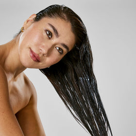 Bumble and bumble after use shiny smooth hair showing anti-frizz benefit