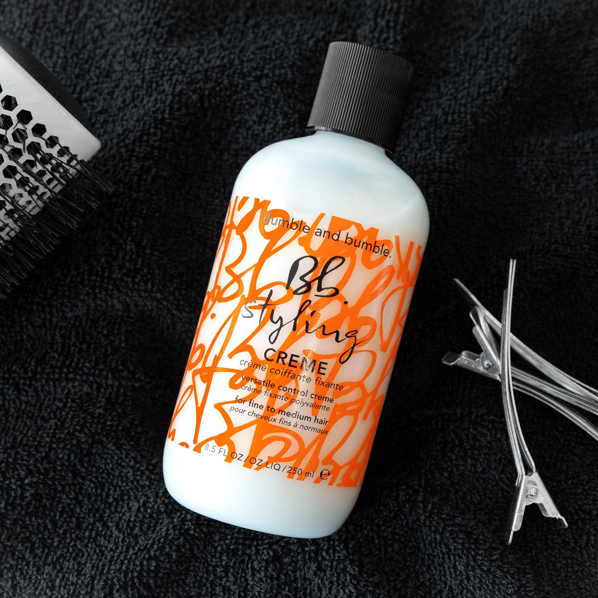 Bumble and bumble label and ingredients closeup, clarifies usage and fragrance notes