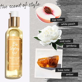 Bumble and bumble oil next to a ruler showing compact 0.85 fl oz size