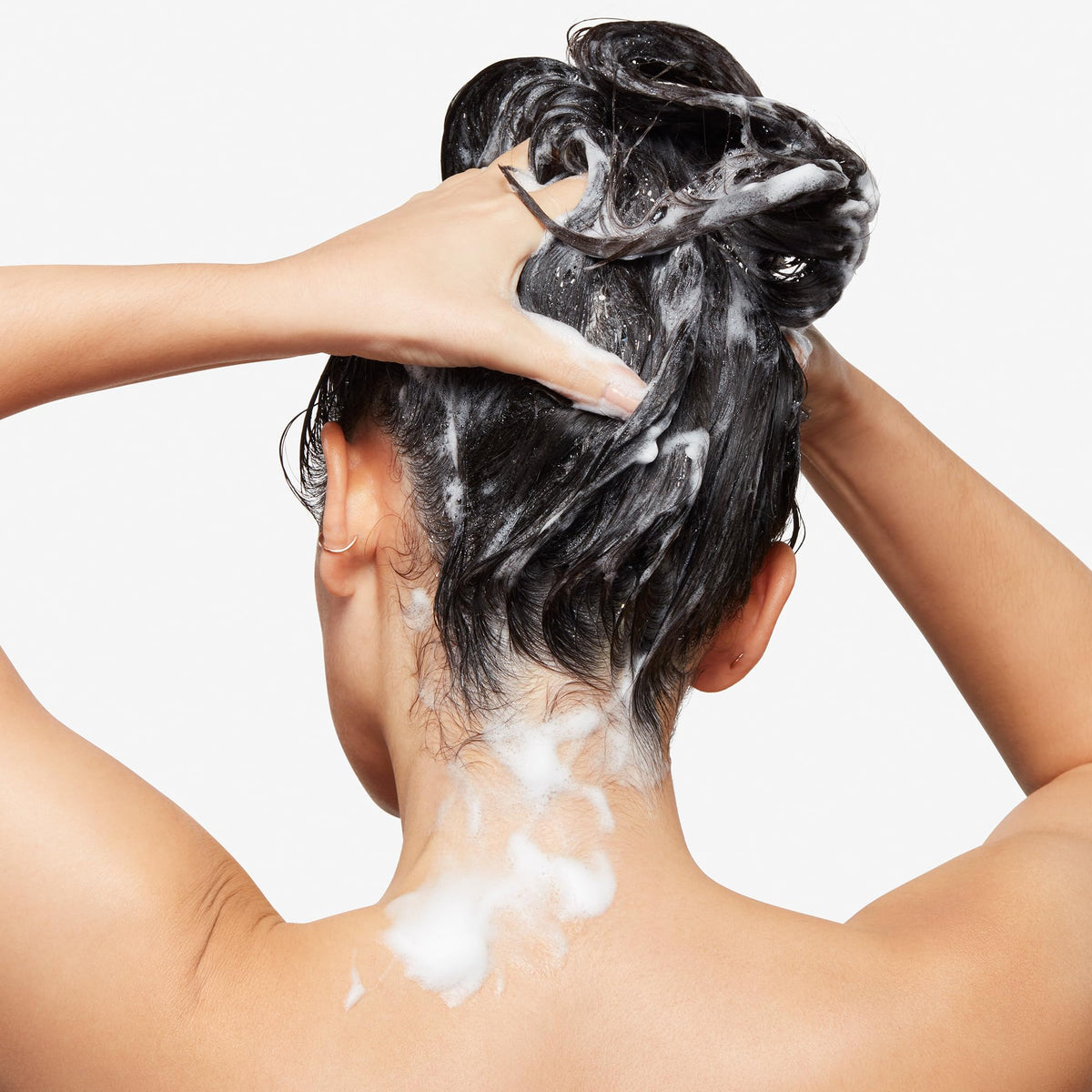 Bumble and bumble close-up foam texture illustrating gentle yet effective cleanse