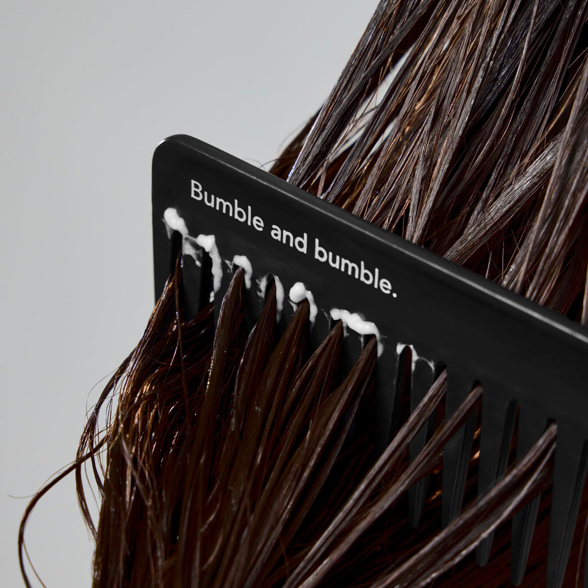 Bumble and bumble product on bathroom shelf styled to suggest everyday luxury use