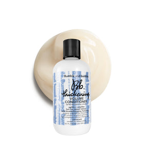 Bumble and bumble. front bottle shot showing volumizing conditioner and size benefit