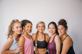 Burlybands securing a thick curly ponytail demonstrating secure fit benefit