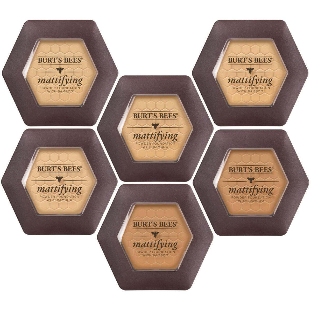 Burt's Bees compact in hand showing size and travel-friendly design