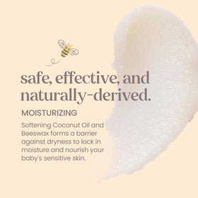 Burt's Bees applying ointment to baby's cheek to soothe dry skin