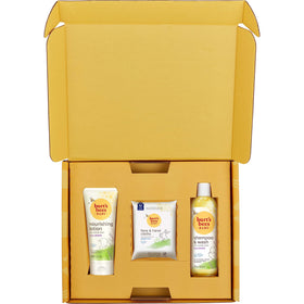 Burt's Bees ingredient label closeup highlighting naturally-derived formulation