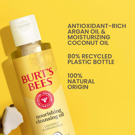 Burt's Bees bottle with coconut and argan visuals illustrating nourishing botanical oils