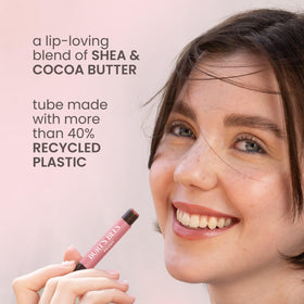 Model wearing Burt's Bees caramel shimmer outdoors illustrating hydrated, luminous lips