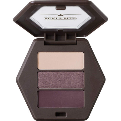 Burt's Bees front compact showing trio shades and portable design benefit
