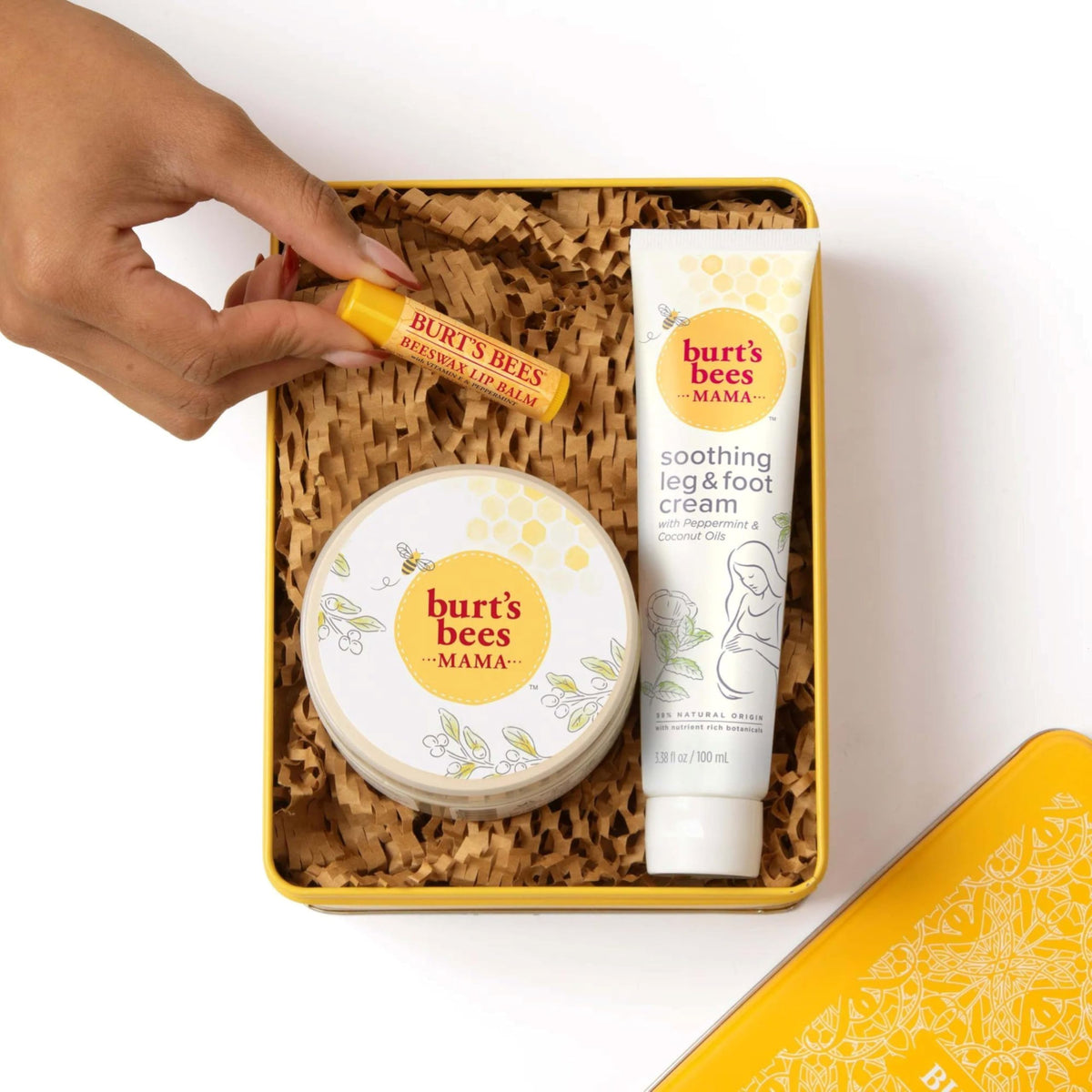 Burt's Bees lifestyle image of mother relaxing after using products
