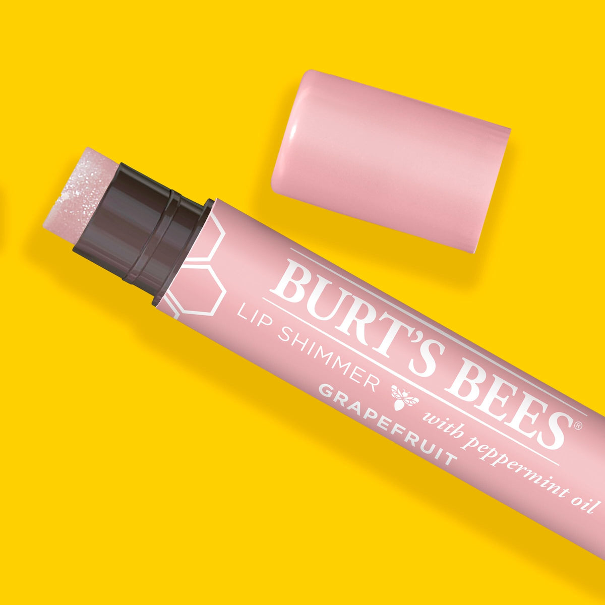 Burt's Bees in purse lifestyle shot demonstrating on-the-go hydration benefit