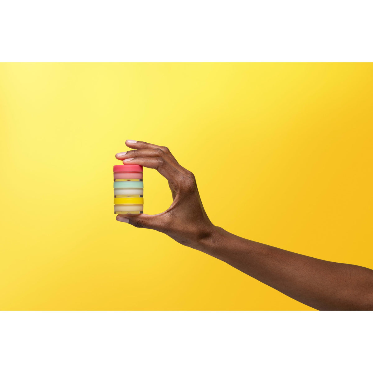 Burt's Bees jars next to Terracycle box illustrating recyclable packaging