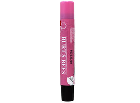 Burt's Bees tube held in hand for size comparison and travel-friendly benefit