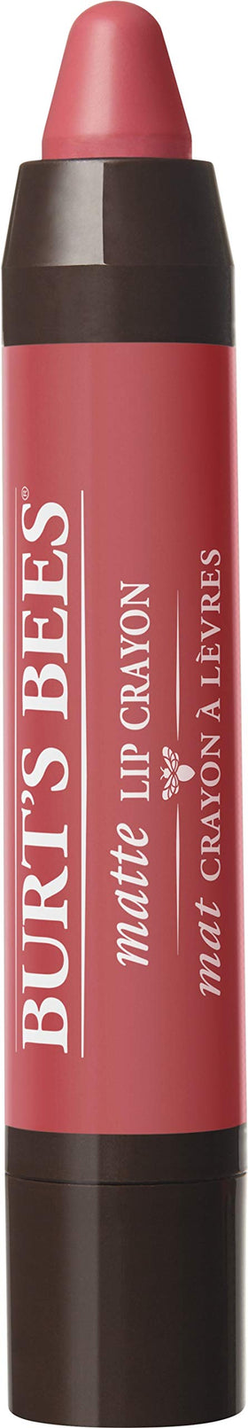 Burt's Bees crayon held in hand showing size and travel-friendly benefit