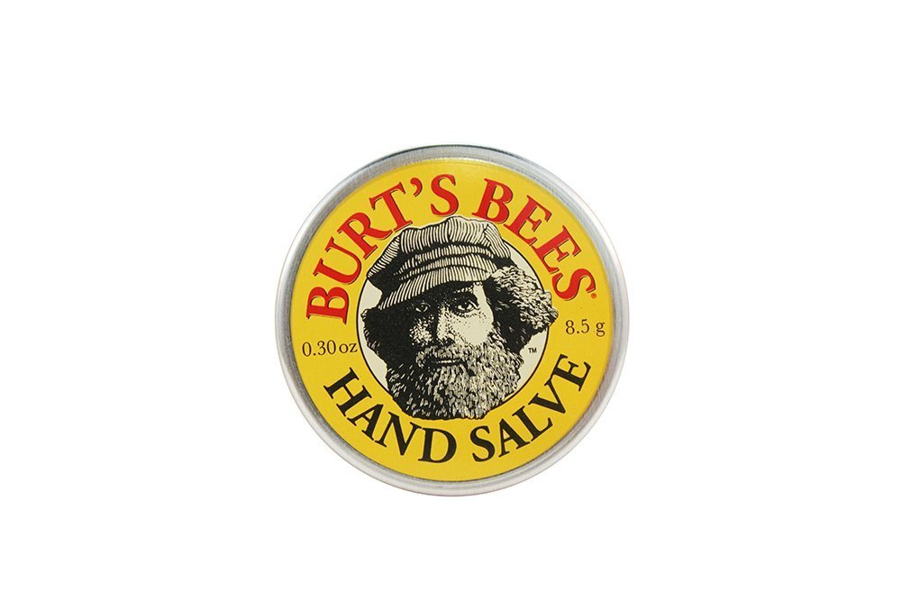 Burt's Bees salve being applied to hands for quick moisturizing relief