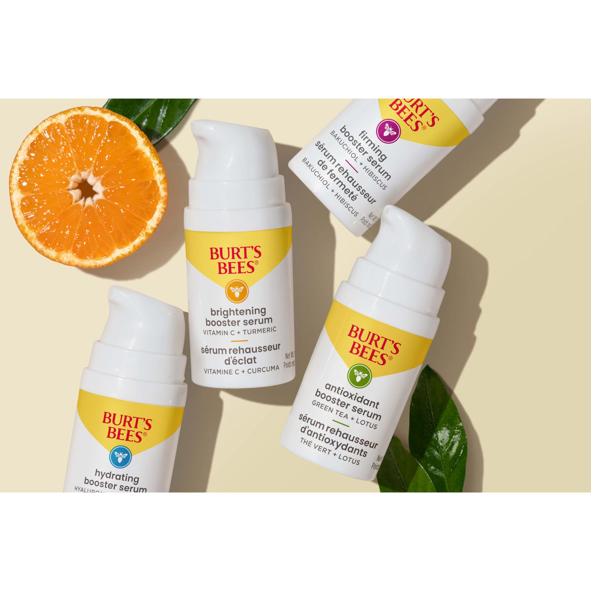 Algae and botanicals beside Burt's Bees serum representing natural-derived ingredients and nourishment