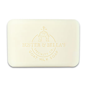 Buster & Bella's 9-ounce soap beside a ruler showing true size and long-lasting, value-packed bar