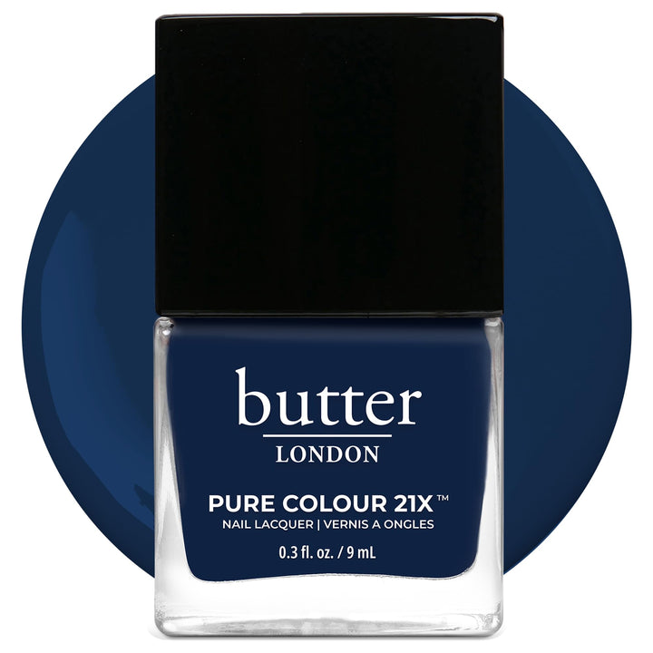 butter LONDON front bottle of Brolly showing deep navy color and sleek packaging benefit: clear brand identity