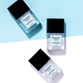 butter LONDON droplet texture image showing glossy surface and UV-protection benefit